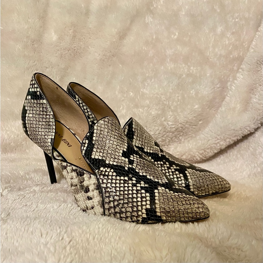 Black and white snake print heels.